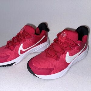 Brand new Nike kids’ sneakers in vibrant red, size US 13C